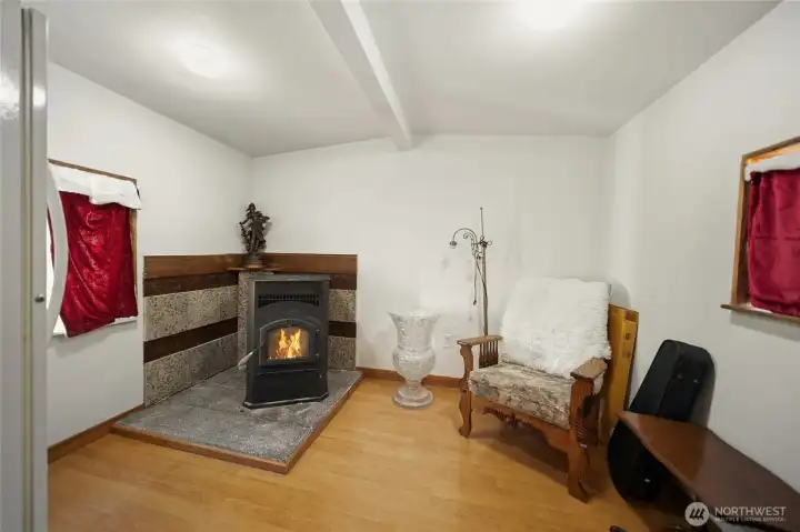 Sitting room area with pellet stove.
