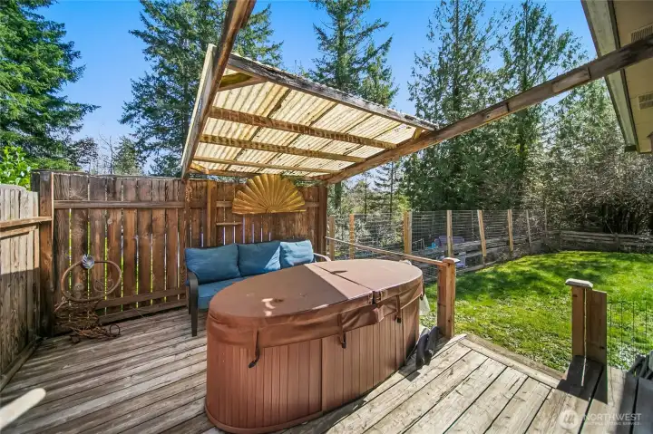 Deck off the primary bedroom, perfect for relaxing outdoors.