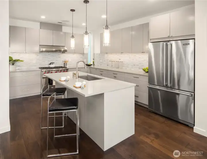 Chef's kitchen with counter eating space