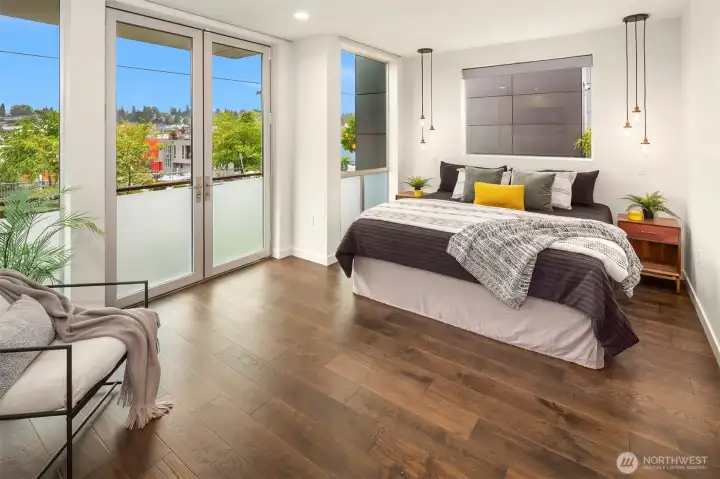 Primary Bedroom with fireplace and view of Lake union