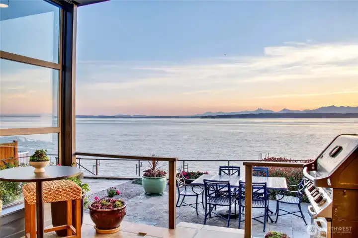 From the covered patio, the Sound and the Olympic Mountains stretch out before you.