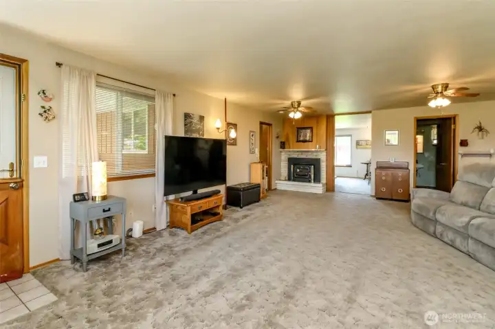 The wood buring insert is one of the two fireplaces that bring instant warmth and coziness to this wonderful home.