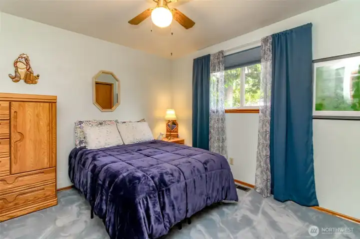 Bedroom three shows off the large space of each bedroom and nice sized windows.