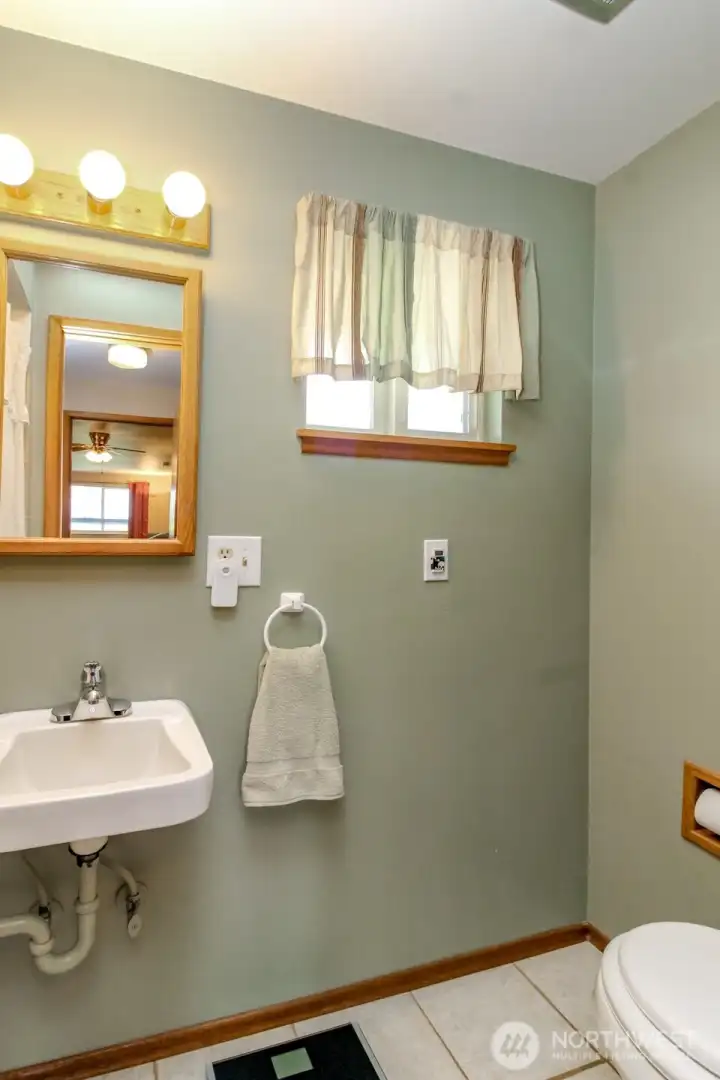 The 3/4 bathroom is located off of the family room with easy access from the garage entrance.