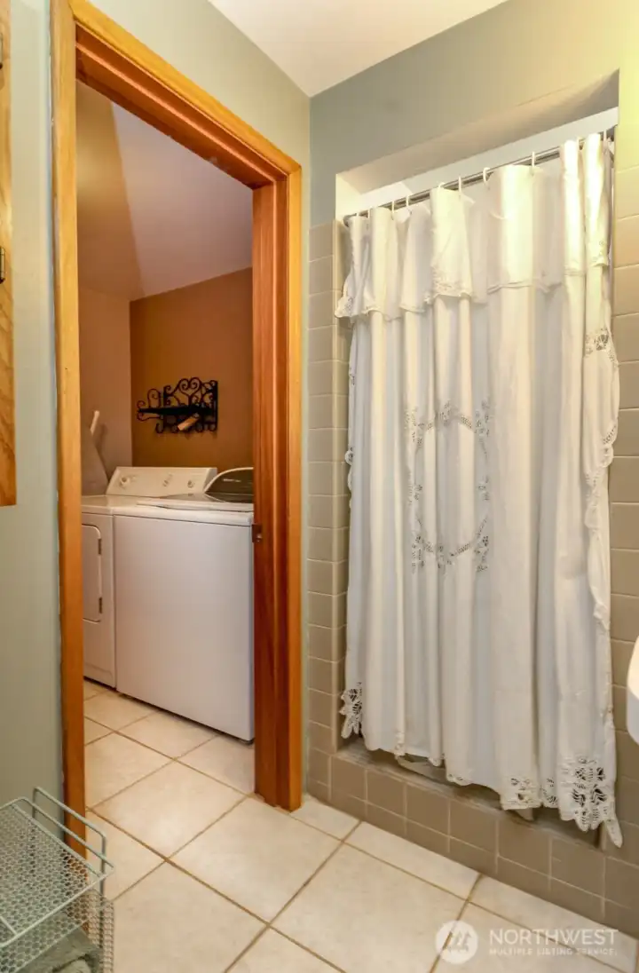 Full step in tiled shower in the 3/4 bathroom.