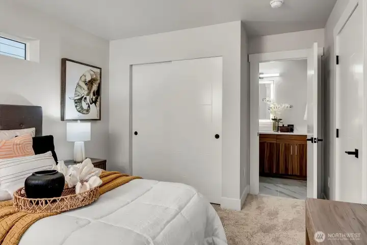 Ground level bedroom leads to bathroom. Ground level bedroom leads to bathroom.