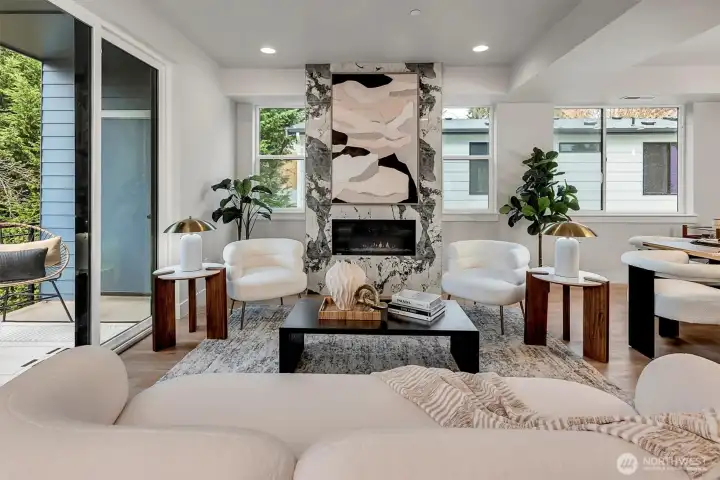Statement fireplace is the focal point of this living area Statement fireplace is the focal point of this living area