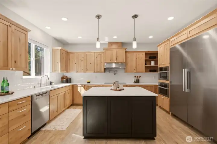 Chef-inspired kitchen with expansive Miele appliances including the oversized Miele fridge with Push2Open doors Chef-inspired kitchen with expansive Miele appliances including the oversized Miele fridge with Push2Open doors
