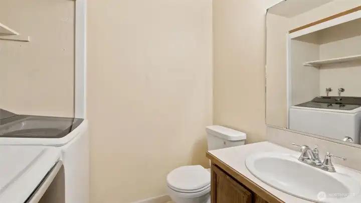 Main floor half bath and laundry room Main floor half bath and laundry room