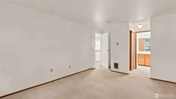 Primary bedroom with attached full bathroom and dual closets Primary bedroom with attached full bathroom and dual closets