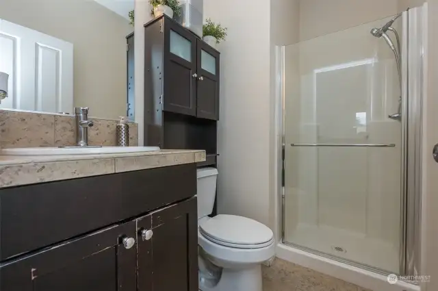 Main floor bathroom with a shower