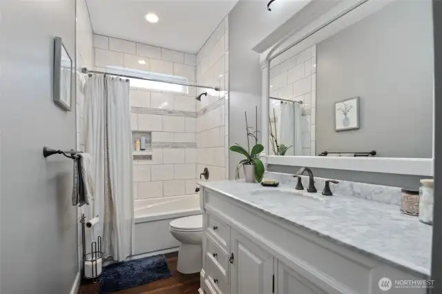 Main level bathroom for guests.