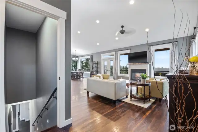 Stairway leads down to basement that could be its own space from the main level.