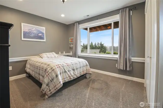 The other bedroom downstairs is also bright and offers plenty of space.