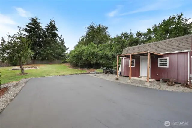 Storage shed with RV parking.