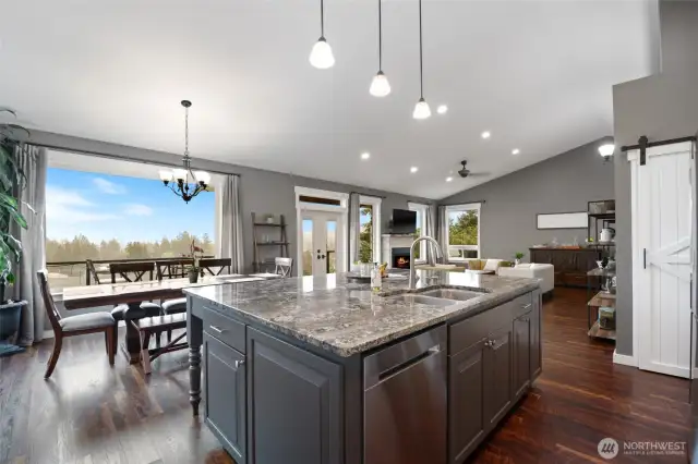 Look at the views form the kitchen. Doors open out to a huge deck for even more space.