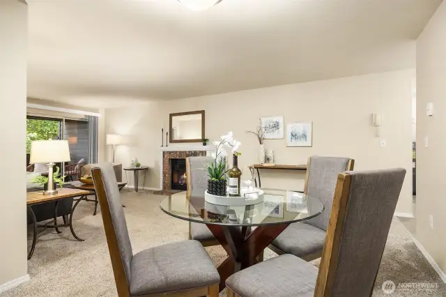 Dining area flowing seamlessly into living space.
