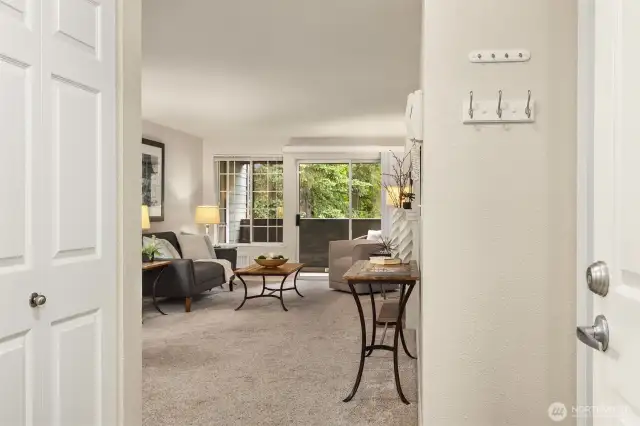 Front door enters to bright and spacious living space.