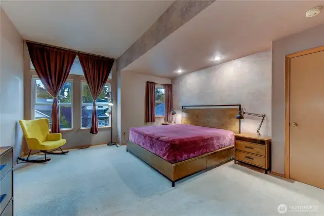 the room with natural light, and a generous walk-in closet.