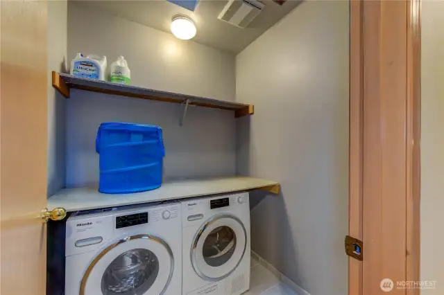 The laundry room is conveniently located on the second level, just steps away from all the bedrooms—making laundry day effortless and efficient.