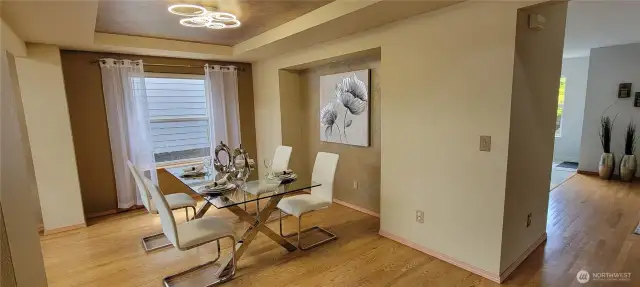 Elegant Formal Dining Room  This stylish dining room offers a sophisticated space for hosting dinner parties or enjoying everyday meals.