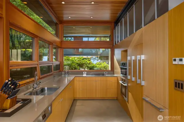 Site-milled fir and bamboo custom cabinetry and casework.