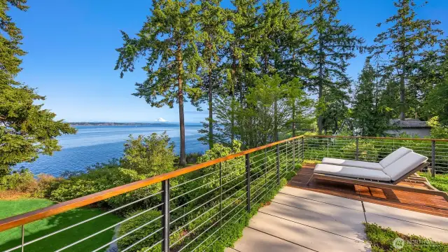 Rooftop garden patio with breathtaking sunrise views.