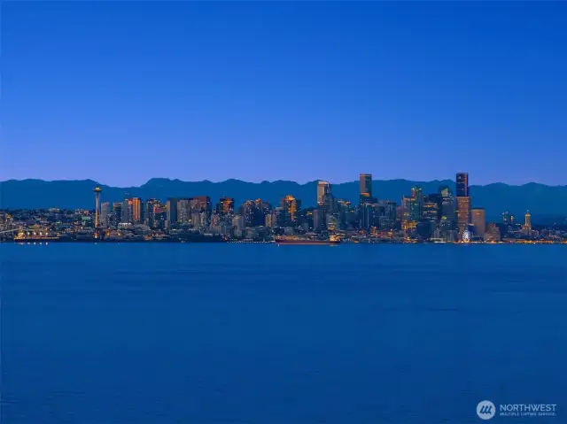 Perched above 86 feet of high-bank waterfront on 2/3 of an acre.