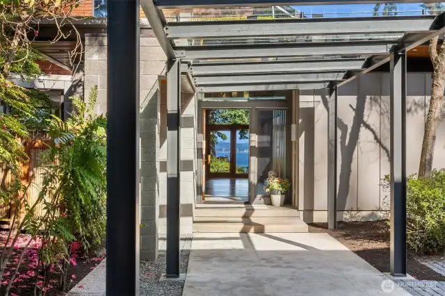 Custom steel-and-glass breezeway links East & West wings.