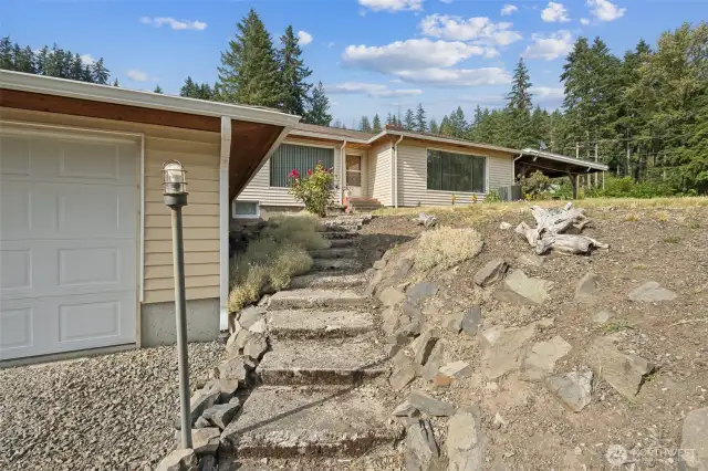 Single car Garage with large tool room in back.