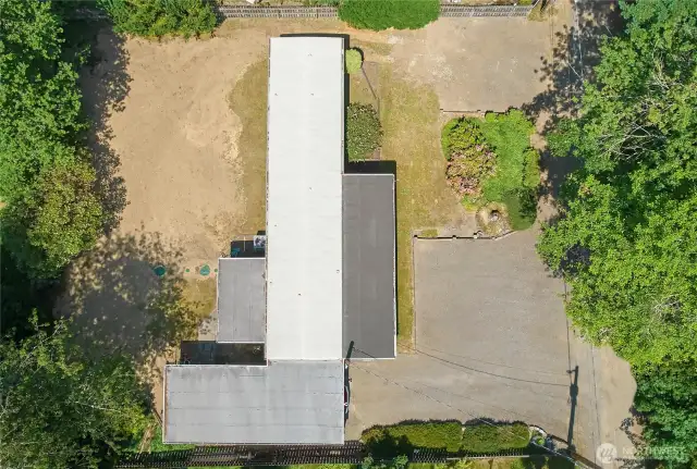 Spacious .21-acre lot --fenced back yard with new drain field and ample parking space.