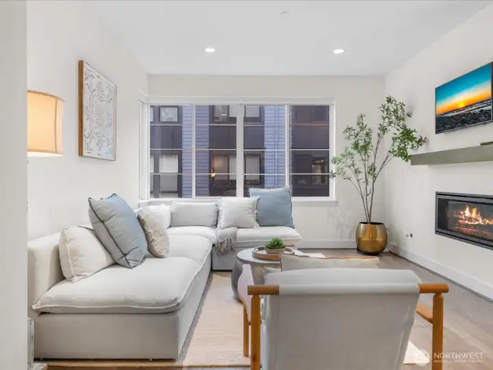 Features cozy gas fireplace!