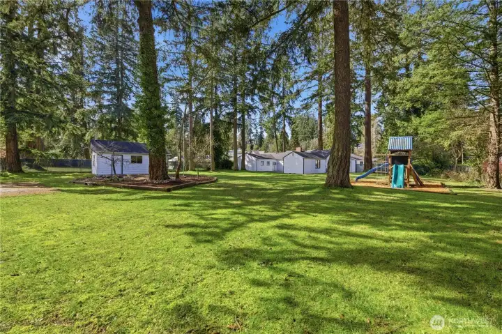 Spacious, level, private, fully fenced backyard with RV and boat parking and room to play!
