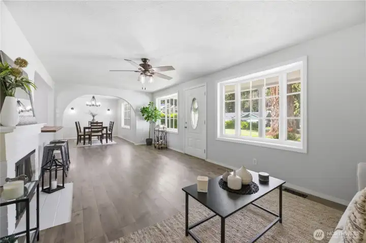 Light, bright, open concept living room, dining and kitchen