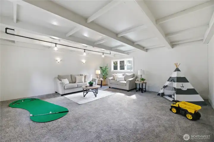 Just off the kitchen is the large recreation space perfect for living room, 4th bedroom, home office (it has a separate entrance)