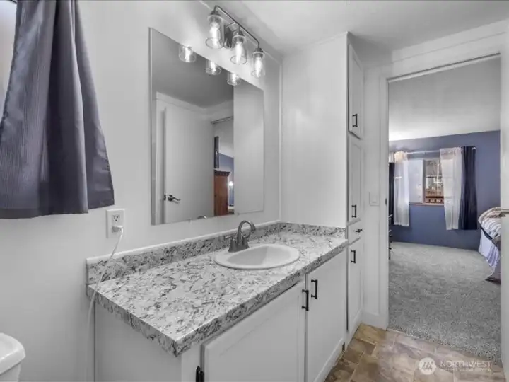 Linen cabinet in Primary ensuite.