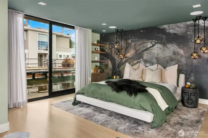 Generous primary suite with two outdoor spaces, two walk-in closets and ensuite bathroom.