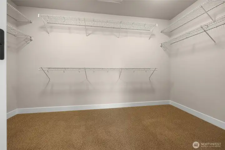 The primary bedroom has a large walk-in closet