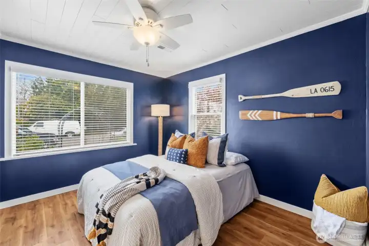 Bedroom #3 featuring laminate wood flooring