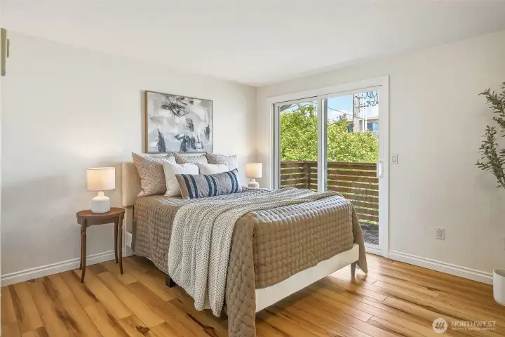 Main bedroom with deck + bathroom