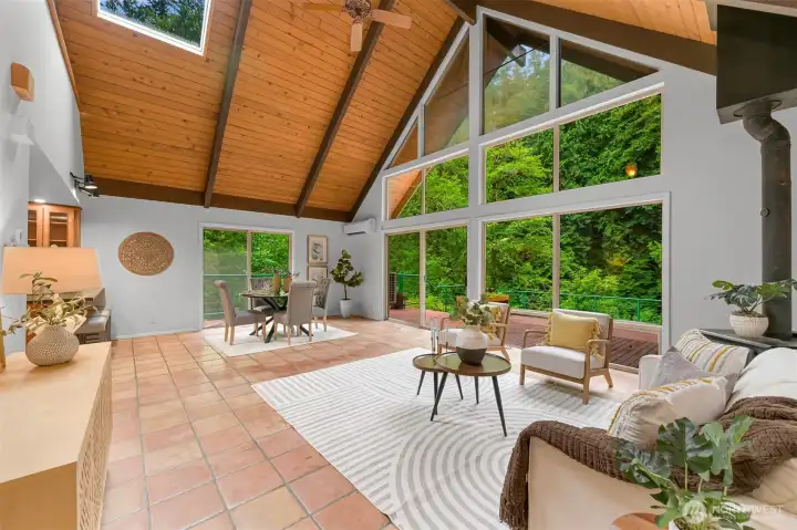 Floor to ceiling windows create a seamless transition between the indoors and natural outdoors. Floor to ceiling windows create a seamless transition between the indoors and natural outdoors.