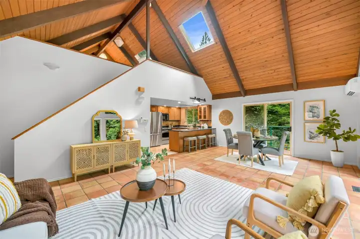 Open floor plan connects the living room, dining area, and kitchen for easy everyday living and entertaining. Open floor plan connects the living room, dining area, and kitchen for easy everyday living and entertaining.