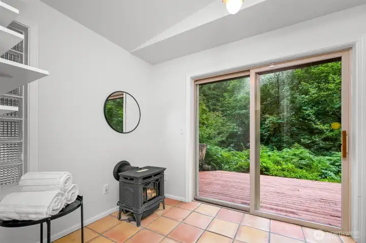 Spa-inspired retreat features direct deck access, creating the perfect space to unwind after a day outdoors. Spa-inspired retreat features direct deck access, creating the perfect space to unwind after a day outdoors.