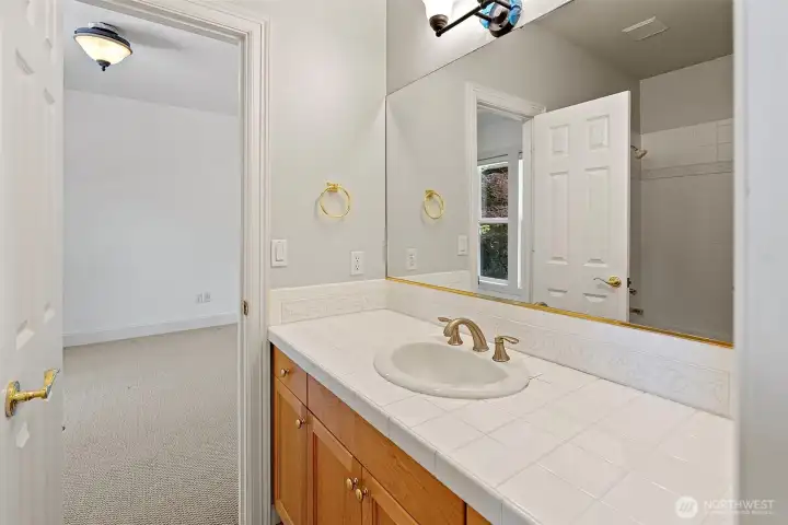 Main Floor Full Bathroom with Bedroom #2 and Bedroom #3 doors