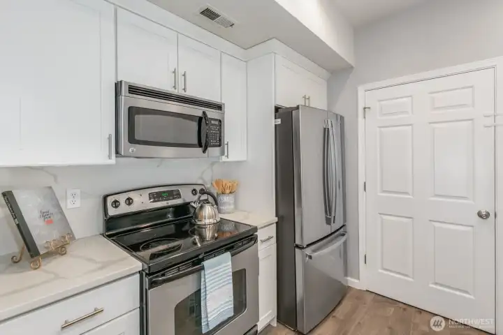Kitchen includes newer refrigerator and convenient layout for everyday living.