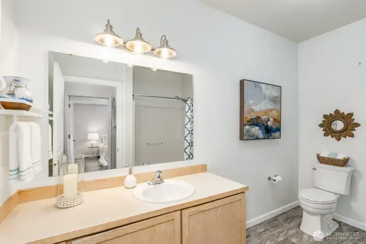 Tile flooring in both bathrooms for easy maintenance and durability.