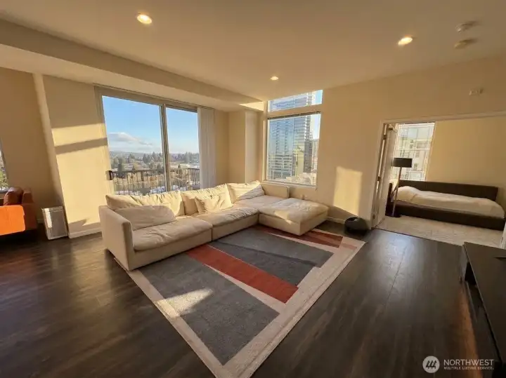 Incredible light, bright and expansive executive level residence living room with west facing views!