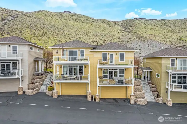 Home is on the right. Views from all front rooms. 4 car garage included. Home is on the right. Views from all front rooms. 4 car garage included.