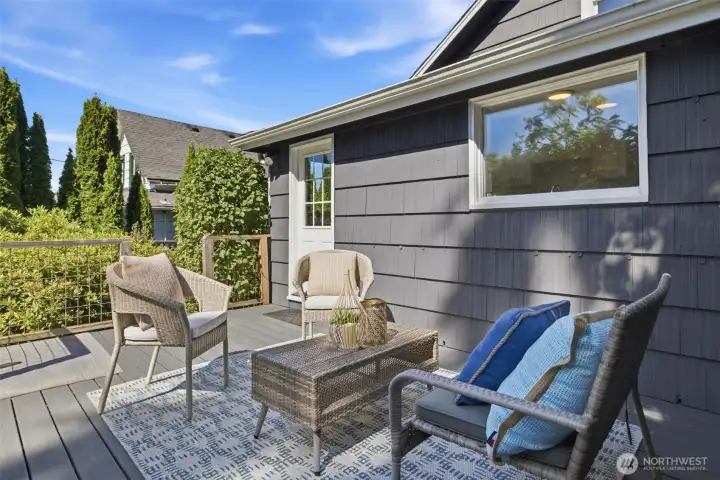 Entertain all summer long on the deck just off the kitchen. Built with Trex decking for longevity and durability.