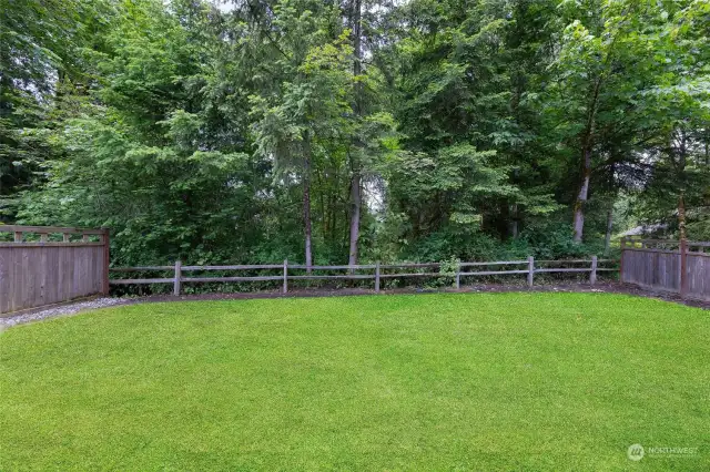 Private, serene, fully-fenced backyard.